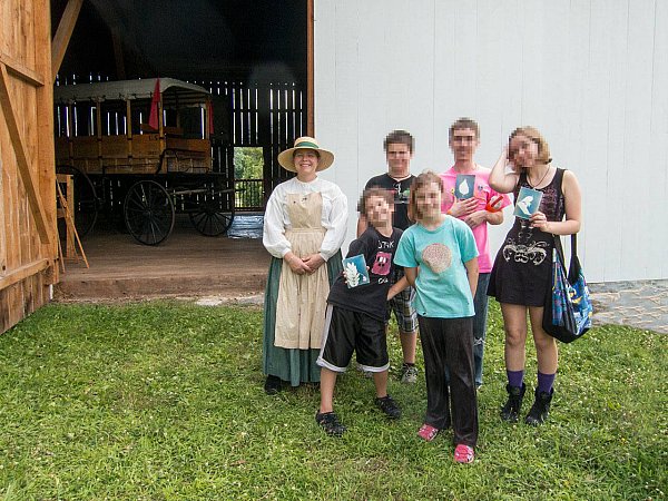 Christine standing with a group of students.